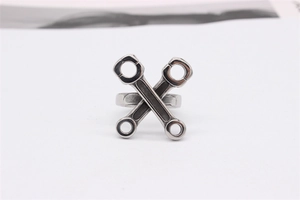 Detailed macro view of vintage titanium steel wrench ring with industrial mechanical design