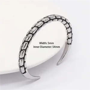 Minimalist vintage titanium steel cuff bracelet for men featuring woven scale texture