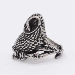 Vintage owl titanium steel men's ring with detailed embossed feathers on tree branch base