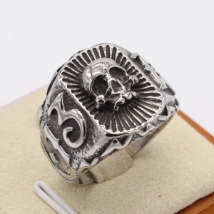 Vintage silver skull ring for men with number 13 engraving in punk rock metal style