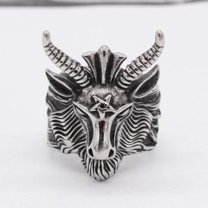 Vintage stainless steel Baphomet ring featuring goat head and pentagram on white backdrop