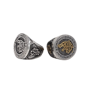 Vintage Viking wolf head ring with intricate rune symbols and Celtic knot patterns
