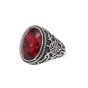 Vintage style titanium steel ring with large oval red gemstone and carved floral pattern