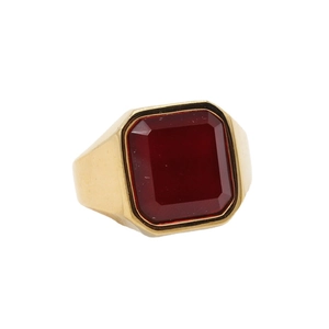 Gold plated stainless steel signet ring featuring a large emerald-cut red ruby gemstone