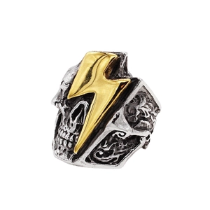 Retro-Punk-Ring aus Edelstahl mit Totenkopf-Relief und goldenem Blitz-Logo Motiv