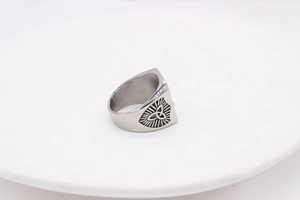 Close-up of Viking wolf ring with Celtic Triquetra knot and black vintage finish steel