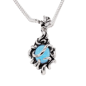 Vintage dragon claw necklace with blue sapphire orb on a silver snake chain