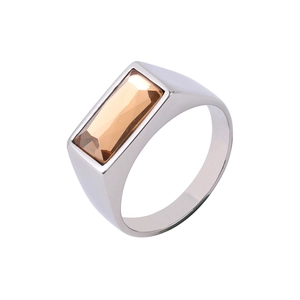 Macro detail of rectangle champagne gemstone inset in a minimalist silver stainless steel ring