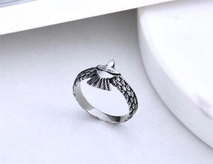 Detailed macro view of the vintage eagle ring showing intricate wing textures and antique finish