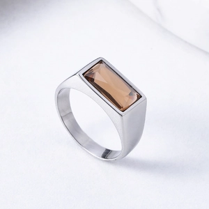 Vintage stainless steel ring featuring a rectangular amber stone with minimalist design