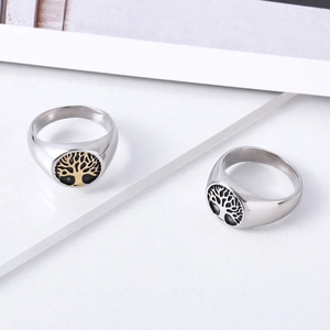 Minimalist Tree of Life signet rings in gold and silver finish on white background