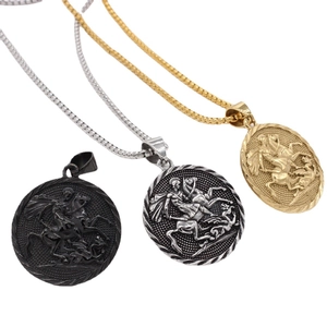 Vintage Saint George and Dragon relief pendant necklaces in gold, silver, and black finish