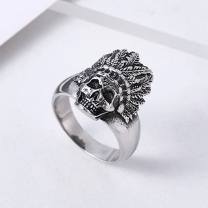 Vintage stainless steel Indian skull ring with detailed feather headpiece and aged finish