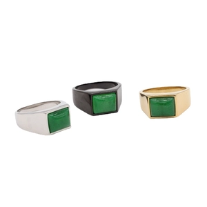 Sleek titanium steel rings with rectangular emerald stones in silver, black and gold finishes
