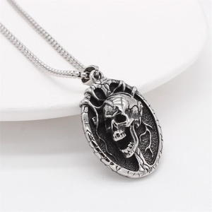 Retro stainless steel skull oval pendant necklace with vintage embossed silver finish
