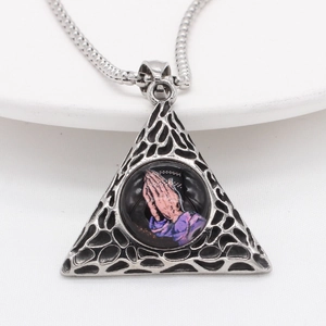 Vintage steel necklace with pyramid Eye of Providence and praying hands pendant