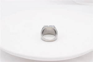 Detailed side view of the wide silver stainless steel band with a flat rectangular surface