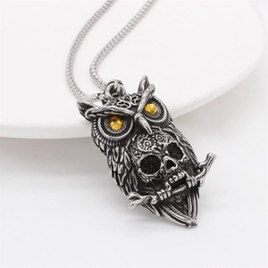 Gothic owl skull pendant necklace in vintage steel with yellow gemstone eyes
