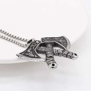 Retro Viking double axe pendant necklace in stainless steel with intricate bird relief