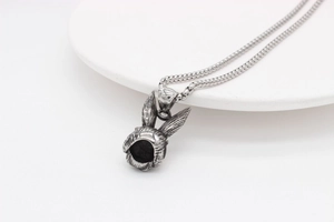 Detailed close-up of retro rabbit pendant with lifelike fur textures and box chain