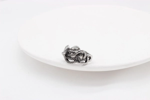 Detailed macro shot of vintage octopus ring showing intricate suction cup textures