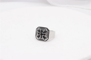 Close-up of vintage steel ring featuring a black Iron Cross on an octagonal shield