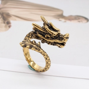 Vintage gold dragon-shaped adjustable ring with detailed 3D carving and punk aesthetic
