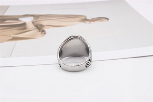 Detail of retro floral engravings on the silver stainless steel tree of life ring for men