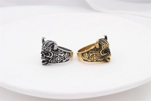 Detailed view of punk vintage skull warrior rings with intricate totem engravings