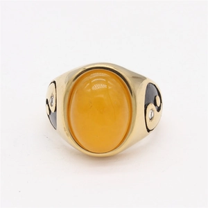 Retro gold titanium steel ring with oval yellow stone and yin yang side patterns