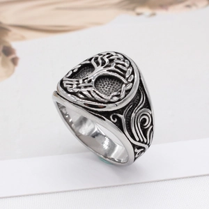 Vintage stainless steel Tree of Life signet ring with intricate vine textures and silver finish