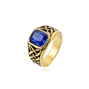 Detailed macro view of the rectangular blue sapphire stone and Celtic knot patterns