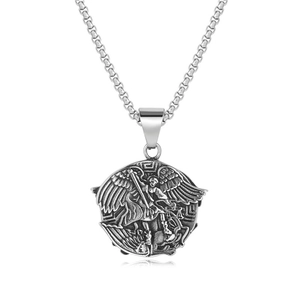Close-up of Saint Michael pendant showing wings and armor details in retro silver steel