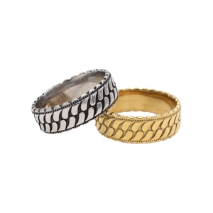Vintage industrial style textured metal rings in gold and silver finish with engraved scales