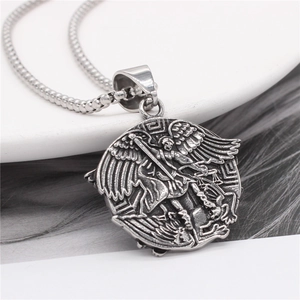 Vintage stainless steel Archangel Michael pendant necklace with detailed wing engraving