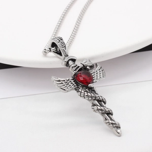 Retro gothic sword pendant necklace with red heart stone and eagle wings design