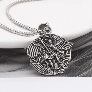 Vintage stainless steel archangel Michael medallion pendant with wings on a curb chain