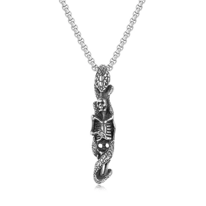 Close-up of gothic skull and coiled snake pendant with vintage silver finish and bead chain