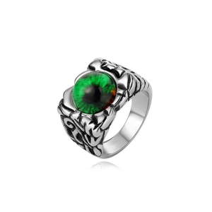 Detail shot of vintage punk steel ring featuring a green evil eye and engraved textures