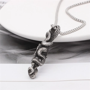 Retro silver dragon pendant necklace with detailed scales on a sturdy box chain