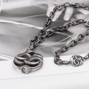 Retro gothic double snake pendant necklace in oxidized steel finish with link chain