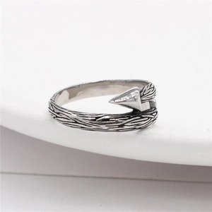 Retro stainless steel arrow ring with vintage bark texture and adjustable open band