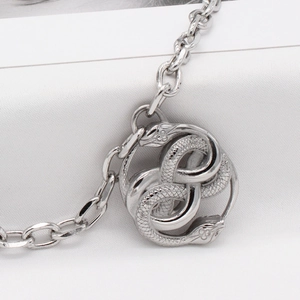 Vintage gothic snake infinity pendant on chunky silver chain for men in stainless steel