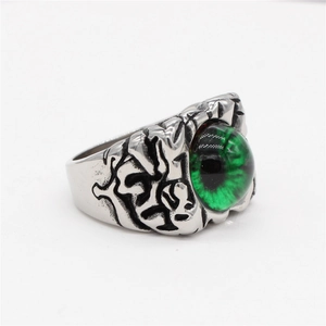 Gothic punk men's titanium steel ring featuring a green evil eye and dragon claw carving