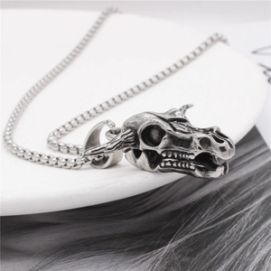 Retro punk bull skull pendant in stainless steel with bead chain, 45-degree angle view