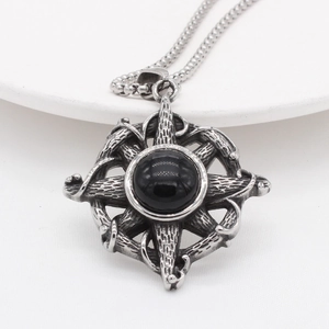 Vintage stainless steel cross necklace with a round black gemstone in gothic punk style