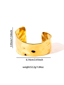 Detailed view of wide gold cuff bracelet with dimensions and hammered texture details