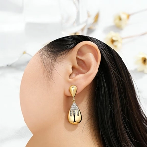 Elegant 925 silver long drop earrings with gold finish and micro-set zircon water drops