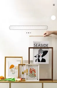Detail of double-sided acrylic frames with pull-out design for flowers and photos