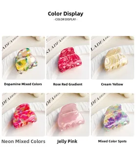 Close-up of acetate hair claws in various marble textures and vibrant colors